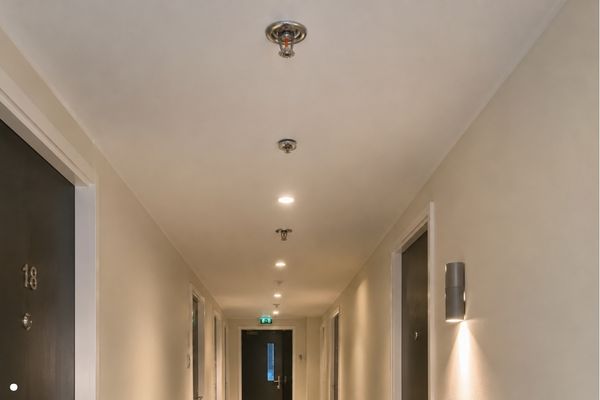 Sprinkler system in residential building corridor
